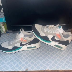 Nike Shoes Only Worn a handful of times. Very cute, stylish sneakers.